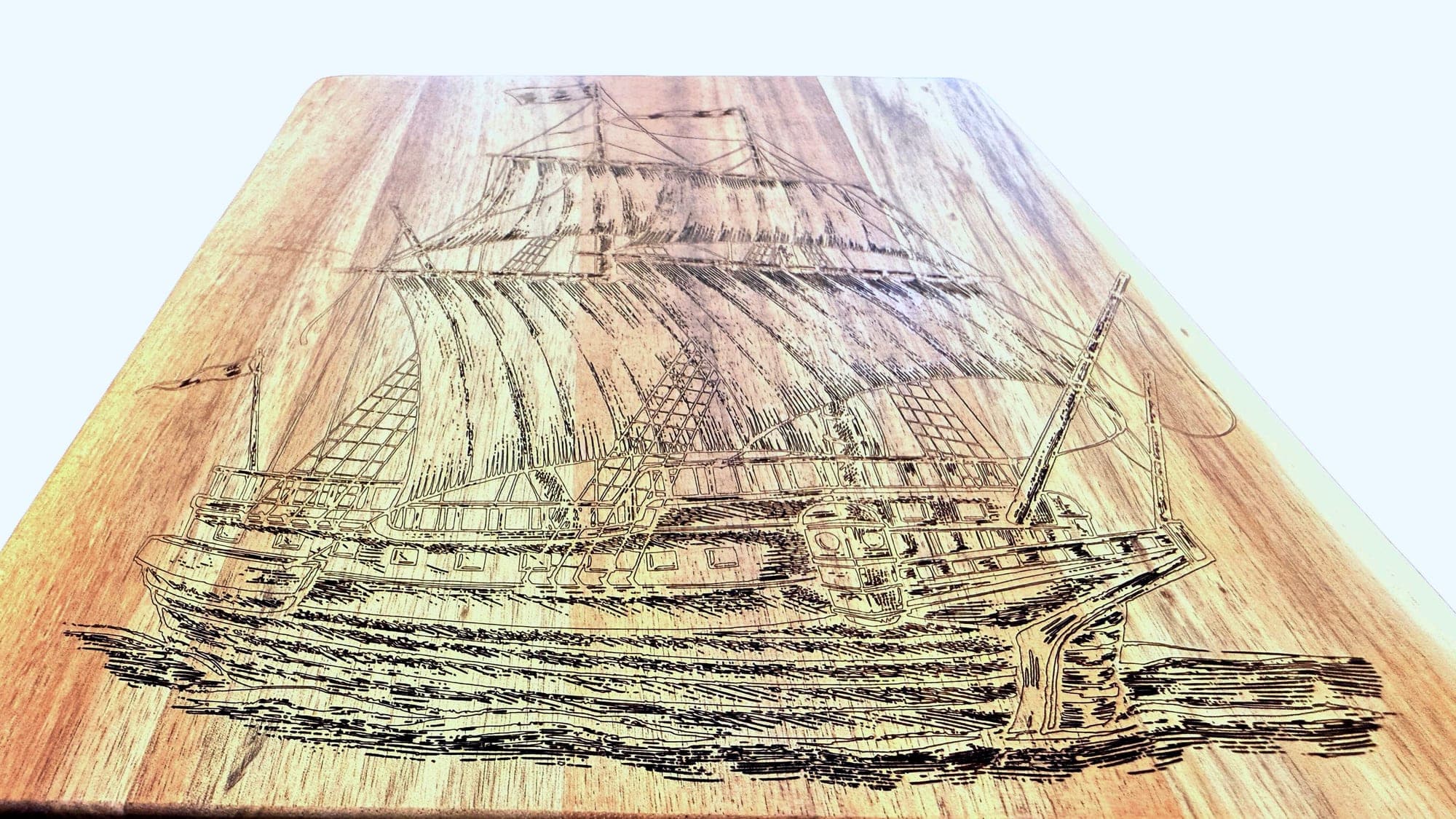 Ship engraving side view — acacia wood detail